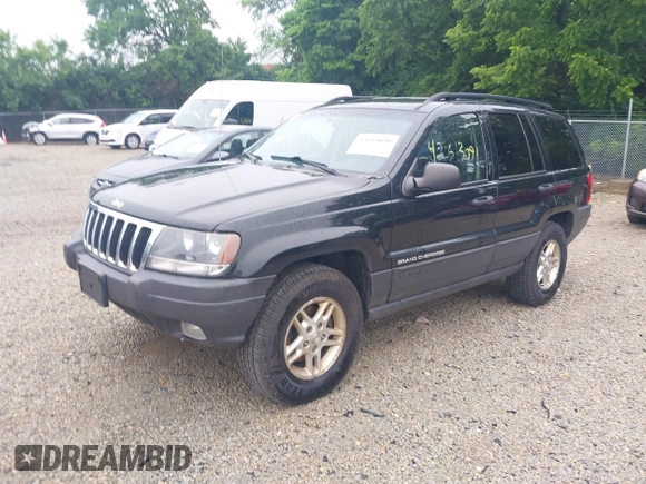 2003 Jeep Grand Cherokee Laredo with VIN 1J4GW48NX3C532874, listed as a IAAI auction lot 42613091 with 165,920 mi miles and . Bid and sale history available at DreamBid. Image 2.