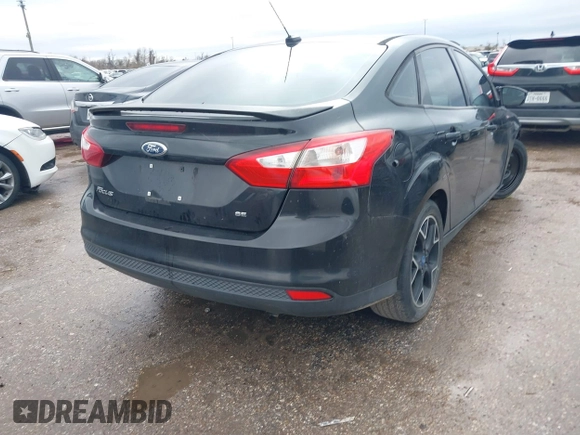 2012 Ford Focus SE with VIN 1FAHP3F24CL174400, listed as a IAAI auction lot 41463139 with 187,132 mi miles and . Bid and sale history available at DreamBid. Image 4.