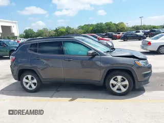2020 Jeep Compass Latitude with VIN 3C4NJCBB3LT136018, listed as a IAAI auction lot 41915073 with 80,785 mi miles and . Bid and sale history available at carsss.com. Image 13.