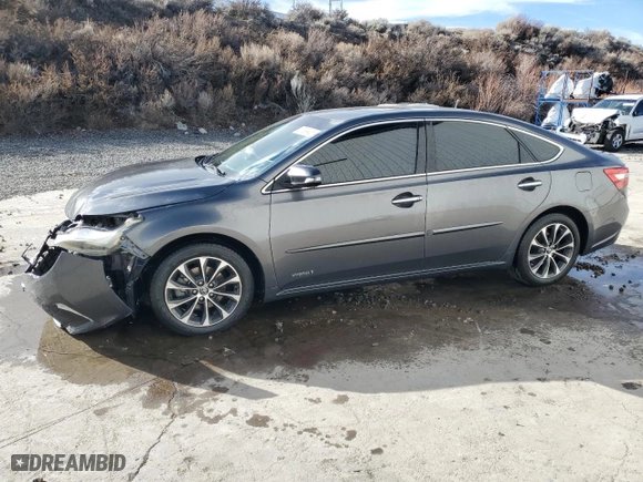 2016 Toyota Avalon Hybrid XLE Premium with VIN 4T1BD1EB6GU056407, listed as a Copart auction lot 87896485 with 129,934 mi miles and Salvage Title. Bid and sale history available at carsss.com. Image 1.