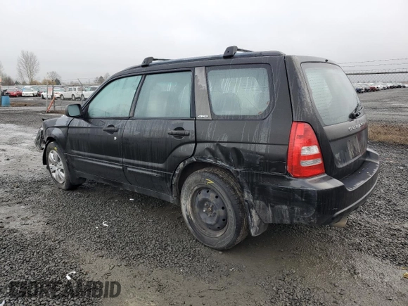 2003 Subaru Forester XS with VIN JF1SG65683H705256, listed as a Copart auction lot 87489904 with 293,143 mi miles and Salvage Title. Bid and sale history available at carsss.com. Image 2.