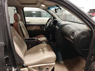 2005 GMC Envoy SLT with VIN 1GKDT13S452349125, listed as a IAAI auction lot 41148381 with 224,049 mi miles. Bid and sale history available at carsss.com. Image 5.