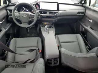 2025 Lexus UX with VIN JTHUCJDH7S2004454, listed as a Copart auction lot 84698594 with 9,684 mi miles and Salvage Title. Bid and sale history available at carsss.com. Image 8.