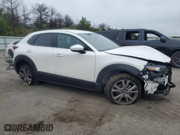 2021 Mazda CX-30 Select with VIN 3MVDMBBL2MM318440, listed as a Copart auction lot 58743695 with 20,825 mi miles and Salvage title. Bid and sale history available at DreamBid. Image 4.