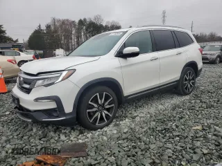 2020 Honda Pilot Touring 8-Passenger with VIN 5FNYF6H95LB053631, listed as a Copart auction lot 47732865 with 67,728 mi miles and Salvage Title. Bid and sale history available at carsss.com. Image 1.