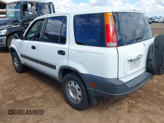 1999 Honda CR-V LX with VIN JHLRD1845XC030860, listed as a IAAI auction lot 41793227 with 297,724 mi miles. Bid and sale history available at carsss.com. Image 3.