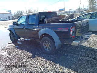 2002 Nissan Frontier XE with VIN 1N6ED27Y22C360239, listed as a IAAI auction lot 40894182 with Not provided miles and . Bid and sale history available at DreamBid. Image 3.