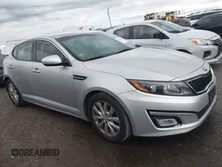 2014 Kia Optima LX with VIN 5XXGM4A71EG329432, listed as a IAAI auction lot 42474661 with 122,948 mi miles and . Bid and sale history available at DreamBid. Image 1.
