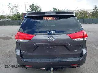 2014 Toyota Sienna XLE with VIN 5TDYK3DC7ES517206, listed as a IAAI auction lot 41945572 with 128,743 mi miles and . Bid and sale history available at DreamBid. Image 17.