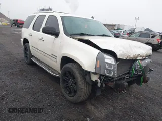2011 GMC Yukon Denali with VIN 1GKS2EEFXBR137172, listed as a IAAI auction lot 41930576 with 117,246 mi miles. Bid and sale history available at carsss.com. Image 1.