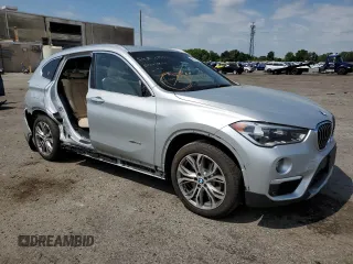 2016 BMW X1 xDrive28i with VIN WBXHT3Z31G4A51718, listed as a Copart auction lot 49331103 with 63,991 mi miles. Bid and sale history available at carsss.com. Image 4.