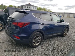 2017 Hyundai Santa Fe 2.4L z VIN 5XYZUDLB5HG483135, wystawiony jako Copart lot #55426735 z przebiegiem 93 470 mil mil oraz Szkoda całkowita • Salvage title. Historia ofert i sprzedaży dostępna na DreamBid. Obrazek 3.