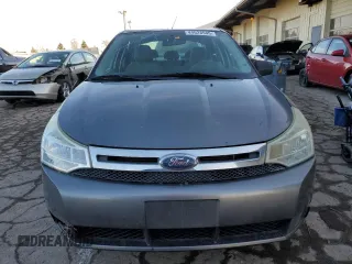 2009 Ford Focus S with VIN 1FAHP34N79W212190, listed as a Copart auction lot 44628945 with 129,568 mi miles and Salvage Title. Bid and sale history available at carsss.com. Image 5.
