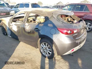 2015 Mazda 3 i Touring with VIN 3MZBM1L73FM145693, listed as a IAAI auction lot 41236304 with Not Provided miles and . Bid and sale history available at carsss.com. Image 3.
