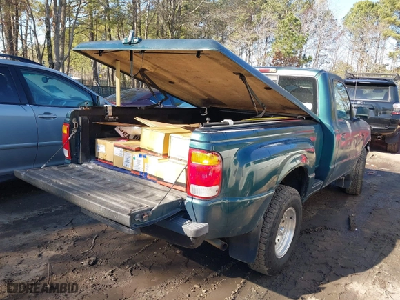 1998 Ford Ranger XL with VIN 1FTYR10CXWTA84196, listed as a IAAI auction lot 41704818 with 199,566 mi miles. Bid and sale history available at carsss.com. Image 8.