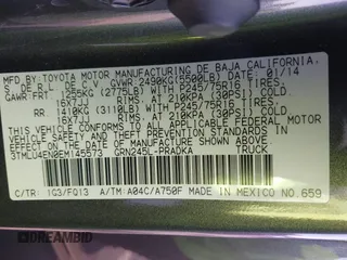 2014 Toyota Tacoma with VIN 3TMLU4EN0EM145573, listed as a IAAI auction lot 41621189 with 178,281 mi miles. Bid and sale history available at carsss.com. Image 9.