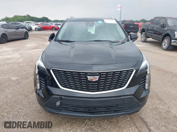 2020 Cadillac XT4 FWD Luxury z VIN 1GYAZAR4XLF146598, wystawiony jako IAAI lot #42211317 z przebiegiem 37 313 mil mil oraz . Historia ofert i sprzedaży dostępna na DreamBid. Obrazek 12.