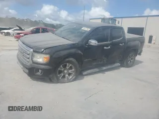 2015 GMC Canyon 2WD SLT with VIN 1GTG5CE31F1263234, listed as a Copart auction lot 76512794 with 113,180 mi miles and Salvage Title. Bid and sale history available at carsss.com. Image 1.