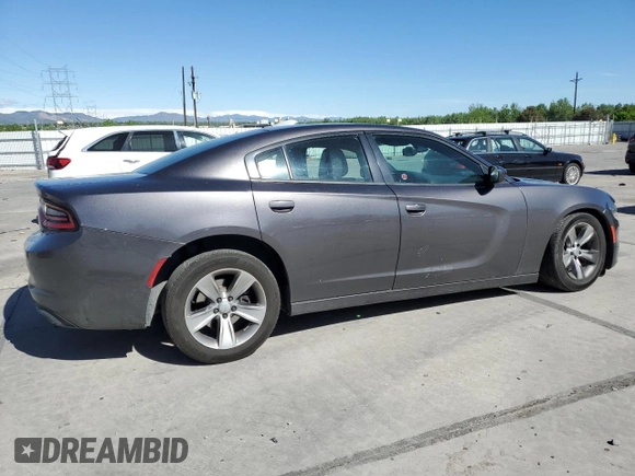 2015 Dodge Charger SXT with VIN 2C3CDXHG9FH856319, listed as a Copart auction lot 57251335 with 171,454 mi miles and Salvage title. Bid and sale history available at DreamBid. Image 3.