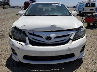 2013 Toyota Corolla L with VIN 5YFBU4EE1DP223927, listed as a Copart auction lot 56172355 with 208,419 mi miles and Salvage Title. Bid and sale history available at DreamBid. Image 5.