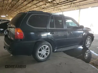 2006 GMC Envoy Denali with VIN 1GKES63M662302685, listed as a Copart auction lot 74315054 with 80,134 mi miles and Salvage Title. Bid and sale history available at carsss.com. Image 3.