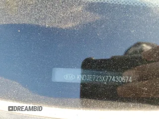 2007 Kia Sportage LX z VIN KNDJE723X77430674, wystawiony jako Copart lot #57050615 z przebiegiem 136 731 mil mil oraz Szkoda całkowita • Salvage title. Historia ofert i sprzedaży dostępna na DreamBid. Obrazek 13.