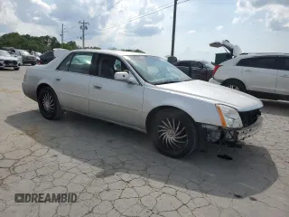 2010 Cadillac DTS 1SA z VIN 1G6KA5EY5AU111898, wystawiony jako Copart lot #54946955 z przebiegiem 44 259 mil mil oraz Szkoda całkowita • Salvage title. Historia ofert i sprzedaży dostępna na DreamBid. Obrazek 4.