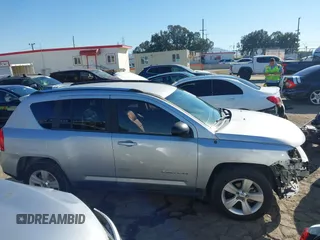 2011 Jeep Compass with VIN 1J4NT1FA4BD139153, listed as a IAAI auction lot 41665481 with 164,412 mi miles. Bid and sale history available at carsss.com. Image 14.