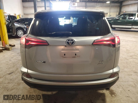 2018 Toyota RAV4 LE with VIN JTMBFREV6JJ225650, listed as a Copart auction lot 62058125 with Not provided miles and Salvage title. Bid and sale history available at DreamBid. Image 6.