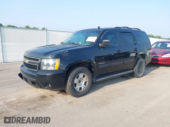 2014 Chevrolet Tahoe LT with VIN 1GNSCBE01ER235571, listed as a IAAI auction lot 42403118 with 238,069 mi miles and . Bid and sale history available at DreamBid. Image 2.