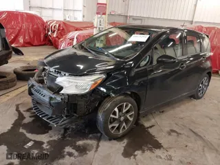 2015 Nissan Versa Note S with VIN 3N1CE2CP7FL400414, listed as a IAAI auction lot 41671294 with 88,885 mi miles. Bid and sale history available at carsss.com. Image 2.