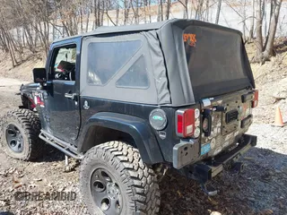 2015 Jeep Wrangler Sahara с VIN 1C4AJWBG7FL703858, выставлен на аукционе IAAI как лот 41720656 с пробегом 110 671 миль миль и . История ставок и продаж доступна на DreamBid. Изображение 3.