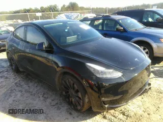 2021 Tesla Model Y Performance with VIN 5YJYGDEF5MF197273, listed as a IAAI auction lot 40867544 with 1 mi miles. Bid and sale history available at carsss.com. Image 1.
