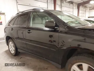 2006 Lexus RX 330 with VIN 2T2HA31U26C092998, listed as a IAAI auction lot 41898941 with 215,501 mi miles and . Bid and sale history available at carsss.com. Image 14.