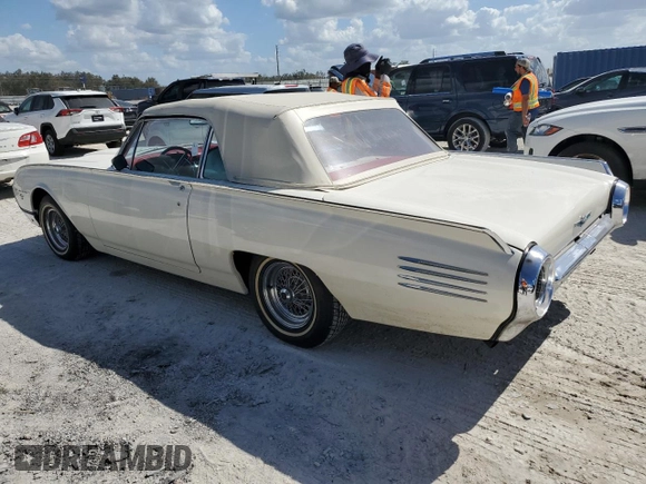 1961 Ford Thunderbird with VIN 1Y73Z112797, listed as a Copart auction lot 77574894 with 22,246 mi miles and Salvage Title. Bid and sale history available at DreamBid. Image 2.