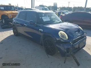 2016 MINI Cooper Hardtop 4 Door S with VIN WMWXU3C54G2D30766, listed as a IAAI auction lot 42008026 with 101,898 mi miles. Bid and sale history available at carsss.com. Image 1.