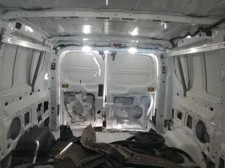 2023 Ford Transit Cargo with VIN 1FTBR1Y88PKA97221, listed as a Copart auction lot 43410475 with 34,927 mi miles and Salvage Title. Bid and sale history available at DreamBid. Image 10.