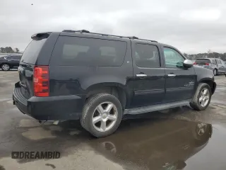 2014 Chevrolet Suburban LT with VIN 1GNSCJE05ER138819, listed as a Copart auction lot 43324175 with 218,114 mi miles and Salvage Title. Bid and sale history available at carsss.com. Image 3.