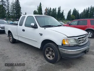2002 Ford F-150 XL with VIN 1FTRX17L32NA19687, listed as a IAAI auction lot 42577258 with 216,685 mi miles and . Bid and sale history available at DreamBid. Image 1.