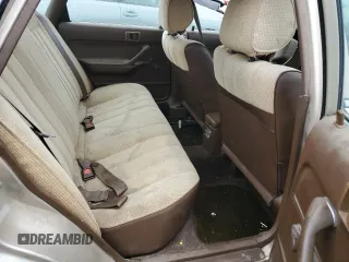 1991 Toyota Camry z VIN 4T1SV24E0MU379572, wystawiony jako Copart lot #78090294 z przebiegiem 242 052 mil mil oraz Szkoda całkowita • Salvage title. Historia ofert i sprzedaży dostępna na DreamBid. Obrazek 10.