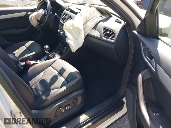 2017 Audi Q3 Premium with VIN WA1BCCFSXHR016914, listed as a IAAI auction lot 41784539 with 94,862 mi miles and . Bid and sale history available at DreamBid. Image 5.