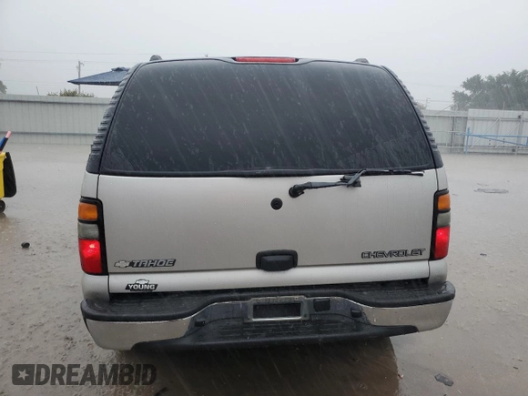 2004 Chevrolet Tahoe LS with VIN 1GNEC13Z24R310768, listed as a Copart auction lot 55886055 with 246,093 mi miles and Salvage title. Bid and sale history available at DreamBid. Image 6.