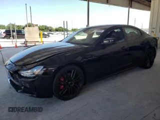 2018 Maserati Ghibli with VIN ZAM57XSA9J1300353, listed as a Copart auction lot 51384995 with 69,354 mi miles and Salvage Title. Bid and sale history available at carsss.com. Image 1.