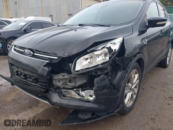 2013 Ford Escape SEL with VIN 1FMCU9H93DUC79592, listed as a IAAI auction lot 42039037 with 63,020 mi miles and . Bid and sale history available at DreamBid. Image 6.