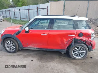 2012 MINI Countryman S with VIN WMWZC5C54CWM13041, listed as a IAAI auction lot 42244303 with 139,733 mi miles and . Bid and sale history available at DreamBid. Image 14.