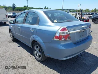2007 Chevrolet Aveo LT with VIN KL1TG56677B049297, listed as a IAAI auction lot 42517516 with 163,130 mi miles and . Bid and sale history available at DreamBid. Image 3.