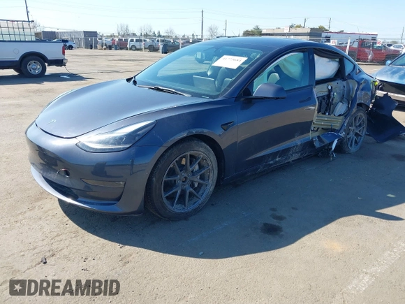 2022 Tesla Model 3 Long Range z VIN 5YJ3E1EB2NF251772, wystawiony jako IAAI lot #41773684 z przebiegiem 28 500 mil mil oraz . Historia ofert i sprzedaży dostępna na DreamBid. Obrazek 17.
