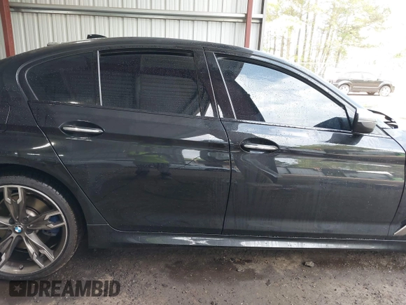 2018 BMW 5 Series M550i xDrive with VIN WBAJB9C51JB035949, listed as a IAAI auction lot 42085727 with Not provided miles and . Bid and sale history available at DreamBid. Image 12.