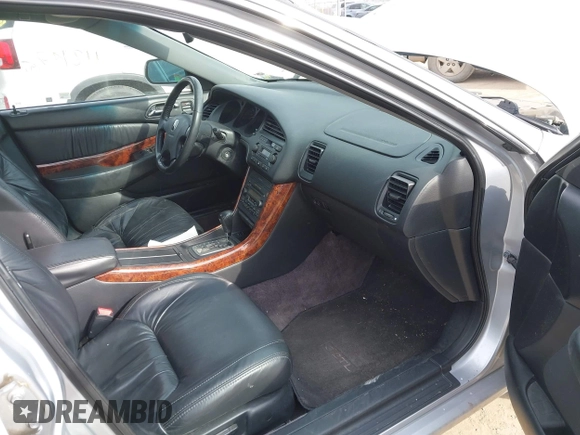 2003 Acura TL with VIN 19UUA56653A087823, listed as a IAAI auction lot 41704916 with 112,147 mi miles. Bid and sale history available at carsss.com. Image 5.