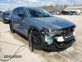 2024 Mazda CX-5 S Carbon Edition with VIN JM3KFBCL4R0460307, listed as a Copart auction lot 49671115 with 17,257 mi miles and Salvage Title. Bid and sale history available at DreamBid. Image 4.